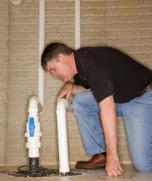 Monterey Bay plumber examines new connection